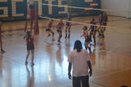 female students playing volleyball